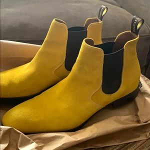 Yellow Doucals slip on boots.